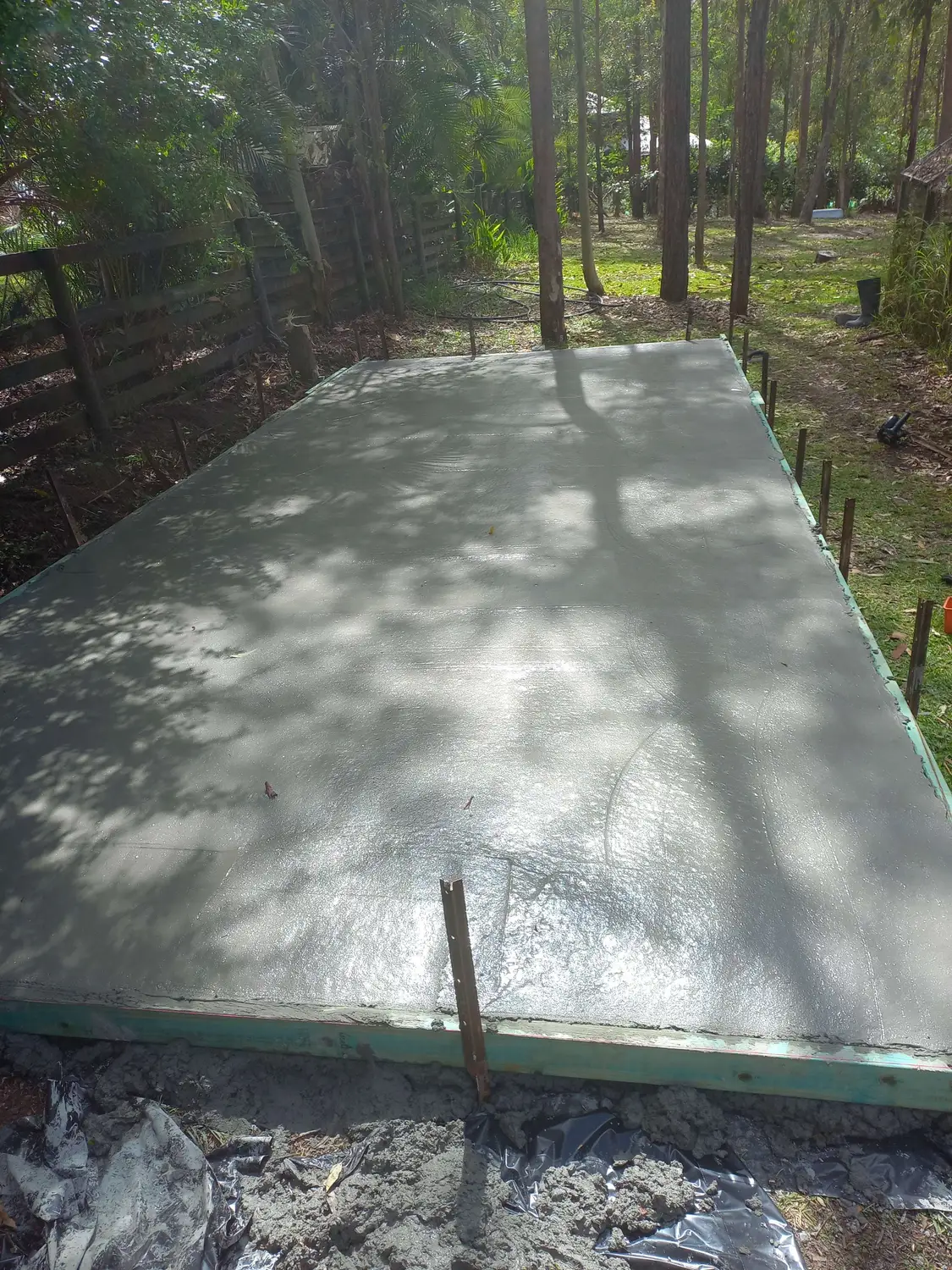 Shed on new slab before, handyman job in Brisbane by Basilisk HMS